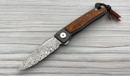 Rinkhals Flipper Damasteel in Desert Ironwood