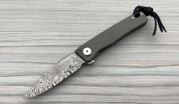 Rinkhals Flipper Damasteel in Solid Titanium